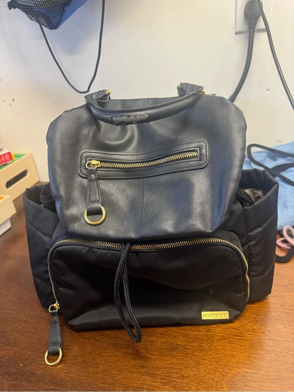 Skip Hop Black and gold Diaper Backpack Tote